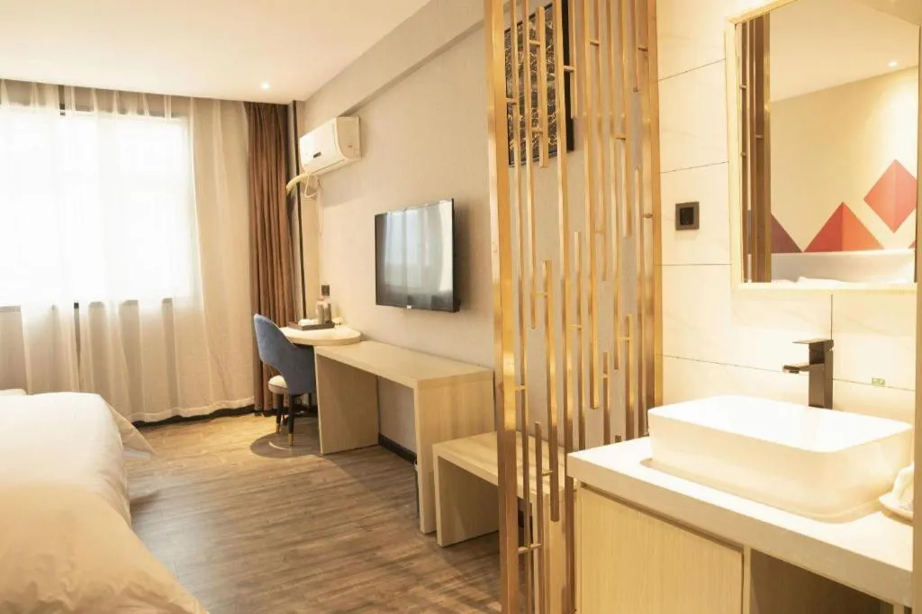 Bed in Borrman Hotel Dongguan Houjie Wanda Plaza Liaoxia Metro Station