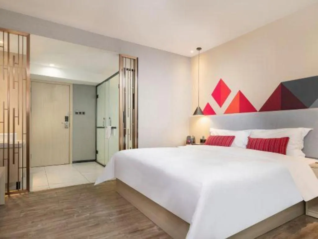 Bed in Borrman Hotel Dongguan Houjie Wanda Plaza Liaoxia Metro Station