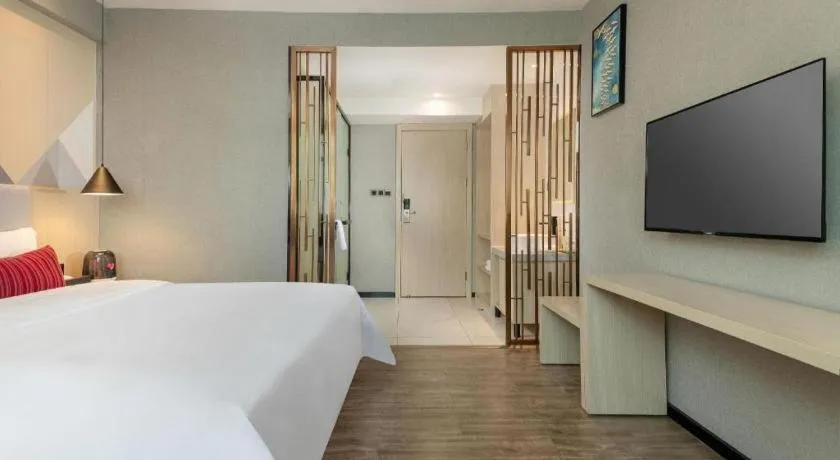 Bed in Borrman Hotel Dongguan Houjie Wanda Plaza Liaoxia Metro Station