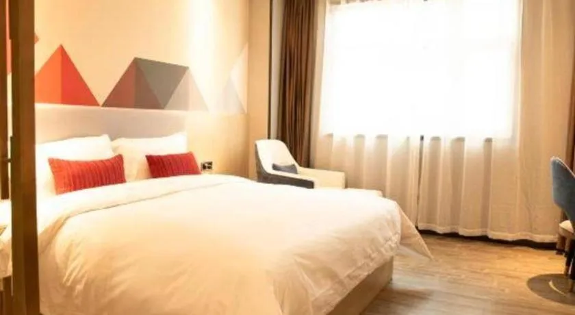 Bed in Borrman Hotel Dongguan Houjie Wanda Plaza Liaoxia Metro Station