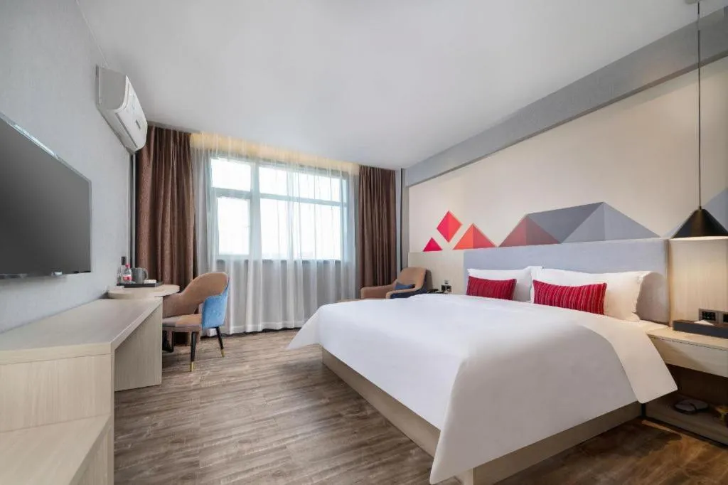 Bed in Borrman Hotel Dongguan Houjie Wanda Plaza Liaoxia Metro Station