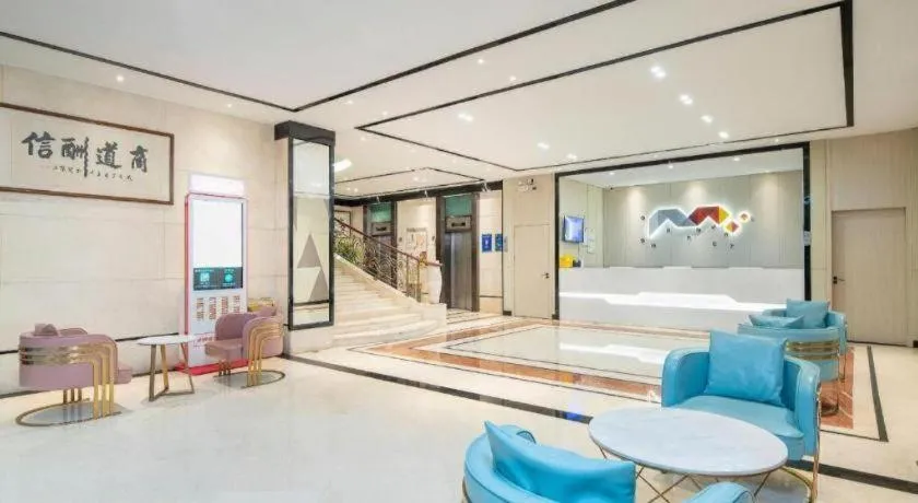 Bed in Borrman Hotel Dongguan Houjie Wanda Plaza Liaoxia Metro Station