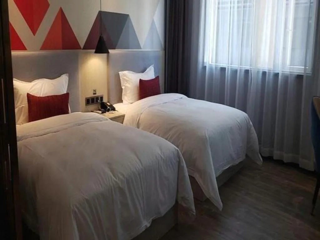 Bed in Borrman Hotel Dongguan Houjie Wanda Plaza Liaoxia Metro Station