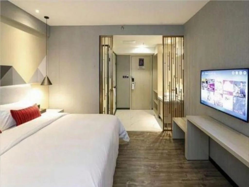 Bed in Borrman Hotel Dongguan Houjie Wanda Plaza Liaoxia Metro Station