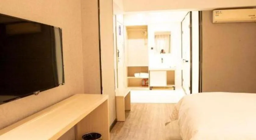 Bed in Borrman Hotel Dongguan Houjie Wanda Plaza Liaoxia Metro Station