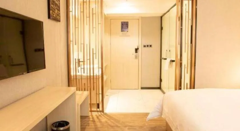 Bed in Borrman Hotel Dongguan Houjie Wanda Plaza Liaoxia Metro Station