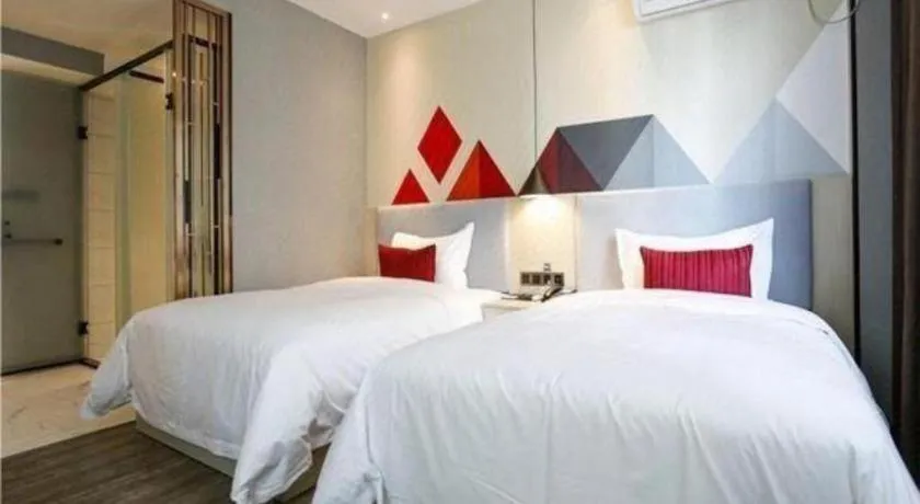 Bed in Borrman Hotel Dongguan Houjie Wanda Plaza Liaoxia Metro Station