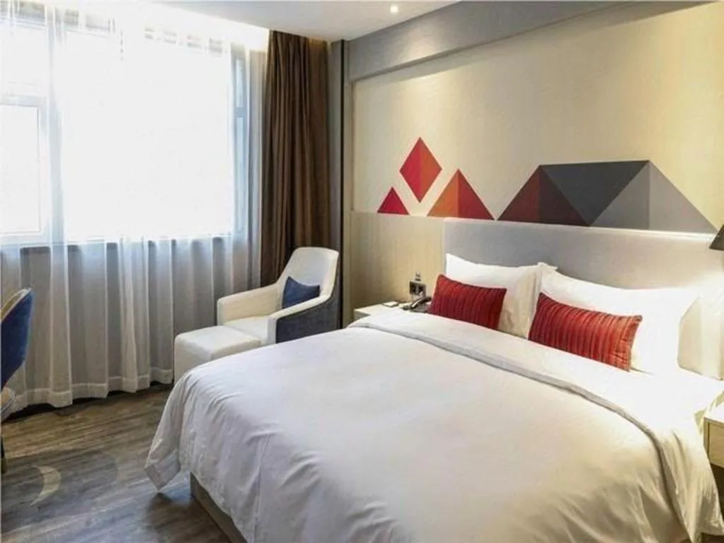Bed in Borrman Hotel Dongguan Houjie Wanda Plaza Liaoxia Metro Station