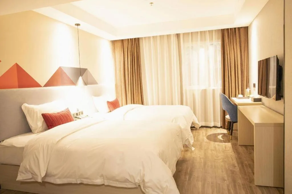 Bed in Borrman Hotel Dongguan Houjie Wanda Plaza Liaoxia Metro Station