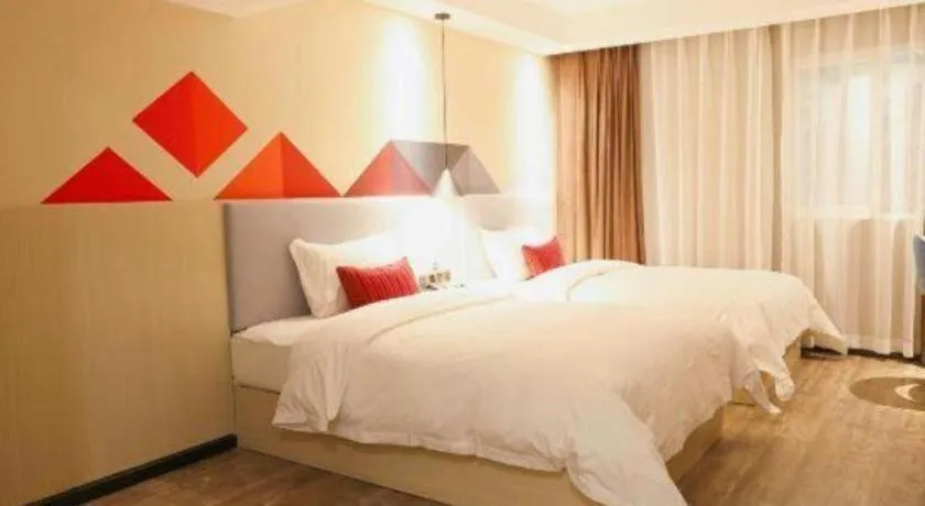 Bed in Borrman Hotel Dongguan Houjie Wanda Plaza Liaoxia Metro Station