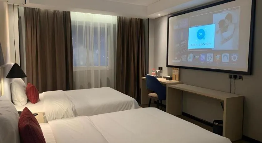 Bed in Borrman Hotel Dongguan Houjie Wanda Plaza Liaoxia Metro Station