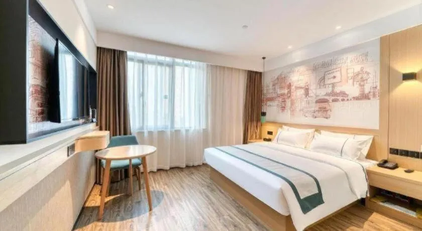 Bed in City Comfort Inn Kunming Xi'an Kang Road