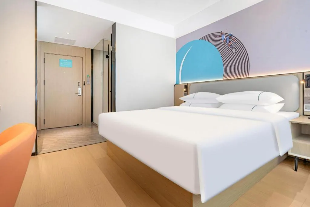 Bed in City Comfort Inn Kunming Xi'an Kang Road