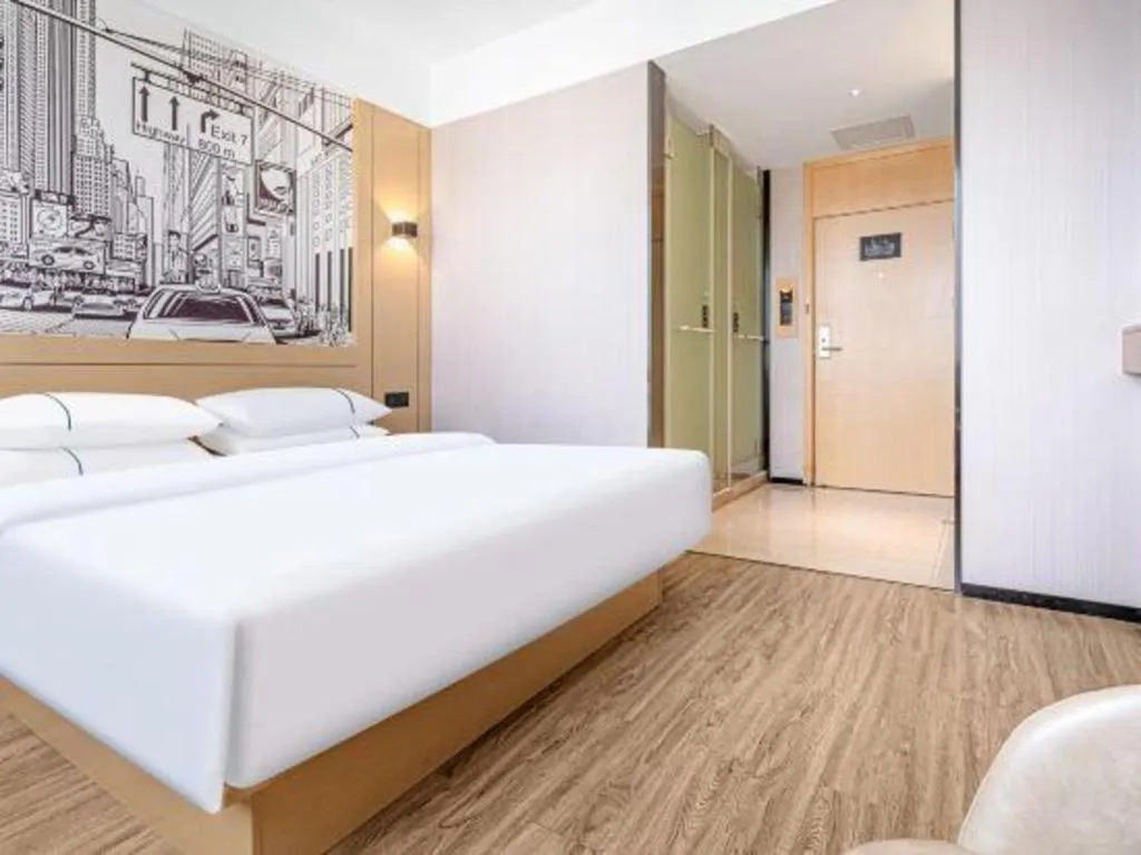 Bed in City Comfort Inn Kunming Xi'an Kang Road