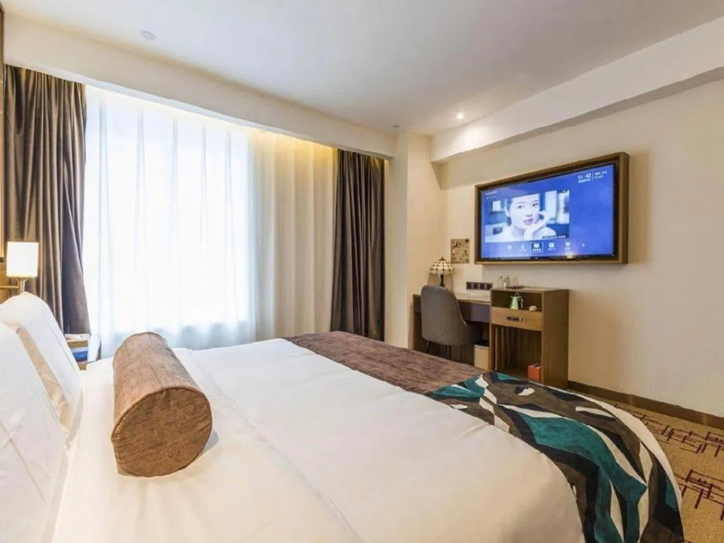 Bed in James Joyce Coffetel Zhengzhou Beilong Wetland Park