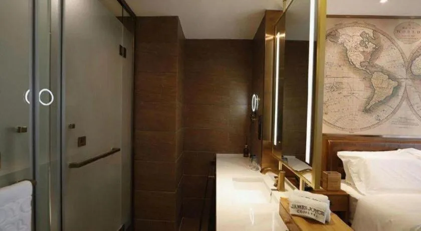 Bed in James Joyce Coffetel Zhengzhou Beilong Wetland Park