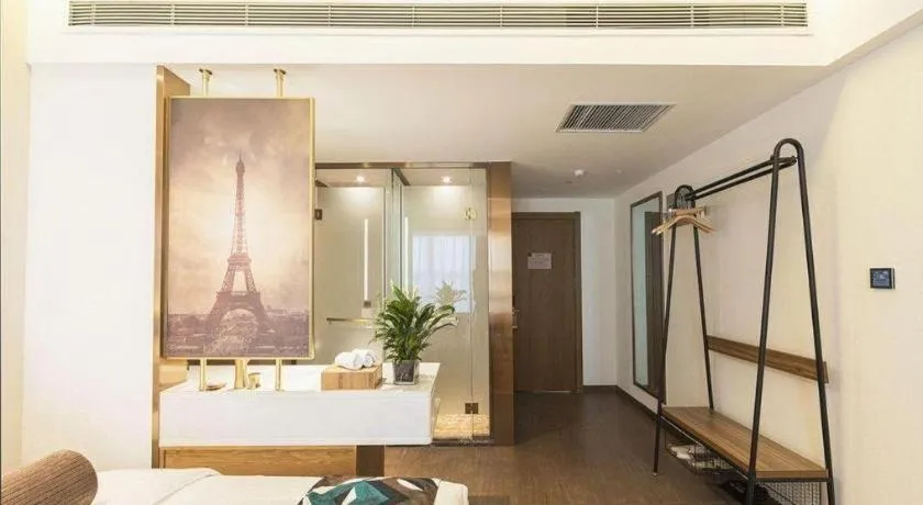 Bed in James Joyce Coffetel Zhengzhou Beilong Wetland Park