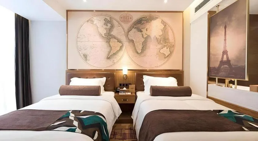 Bed in James Joyce Coffetel Zhengzhou Beilong Wetland Park