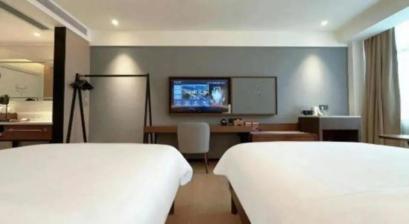 Bed in Campanile Hotel Shenzhen Bay Convention and Exhibition Center