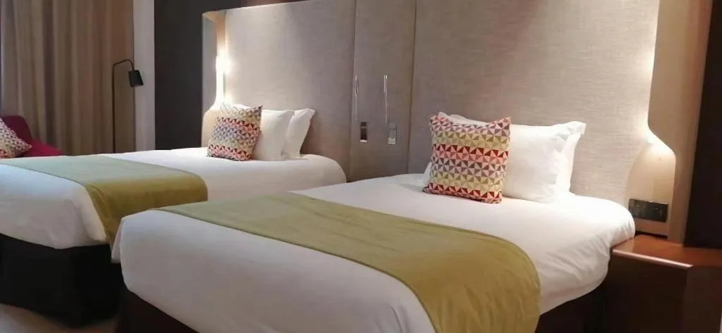 Bed in Campanile Hotel Shenzhen Bay Convention and Exhibition Center