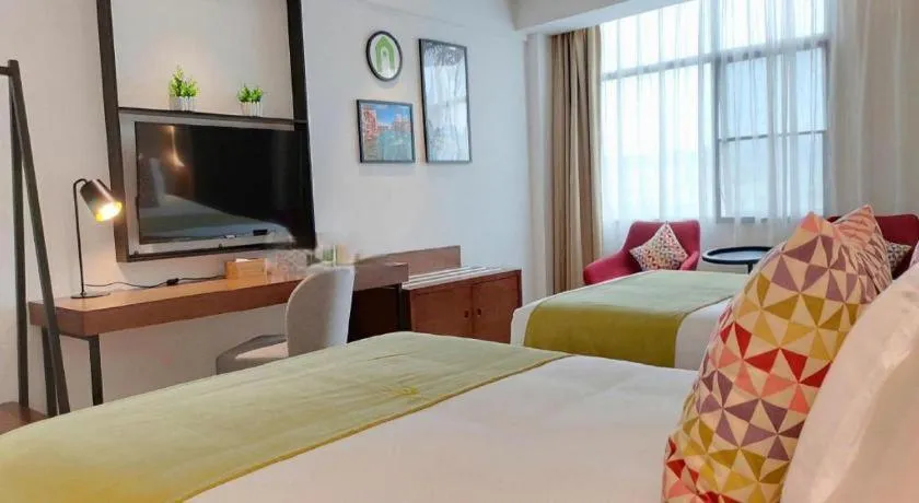 Bed in Campanile Hotel Shenzhen Bay Convention and Exhibition Center