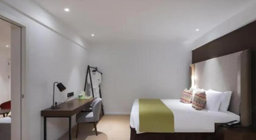 Bed in Campanile Hotel Shenzhen Bay Convention and Exhibition Center