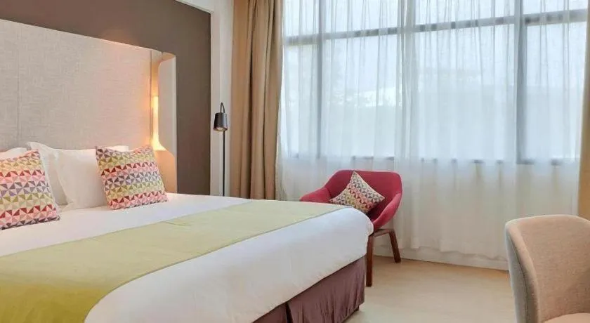 Bed in Campanile Hotel Shenzhen Bay Convention and Exhibition Center