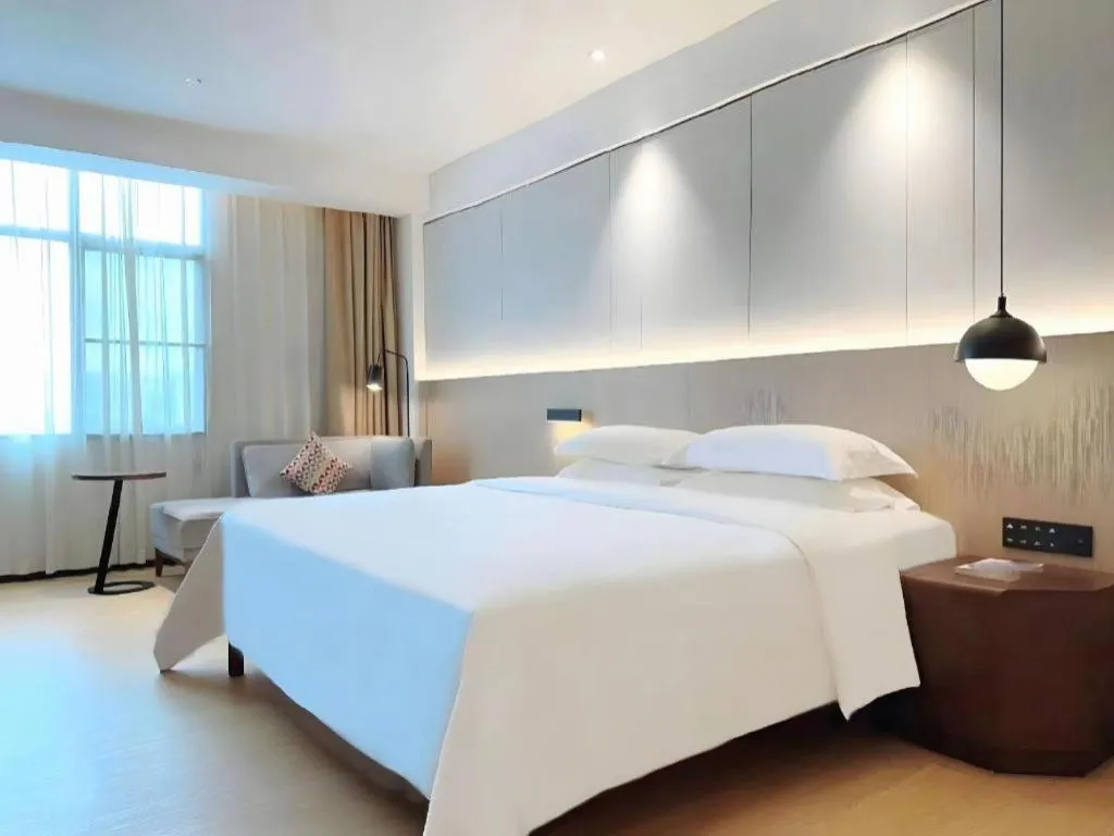 Bed in Campanile Hotel Shenzhen Bay Convention and Exhibition Center