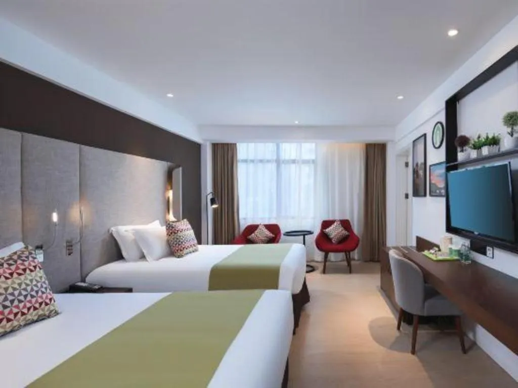 Bed in Campanile Hotel Shenzhen Bay Convention and Exhibition Center