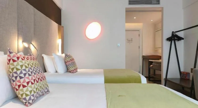 Bed in Campanile Hotel Shenzhen Bay Convention and Exhibition Center