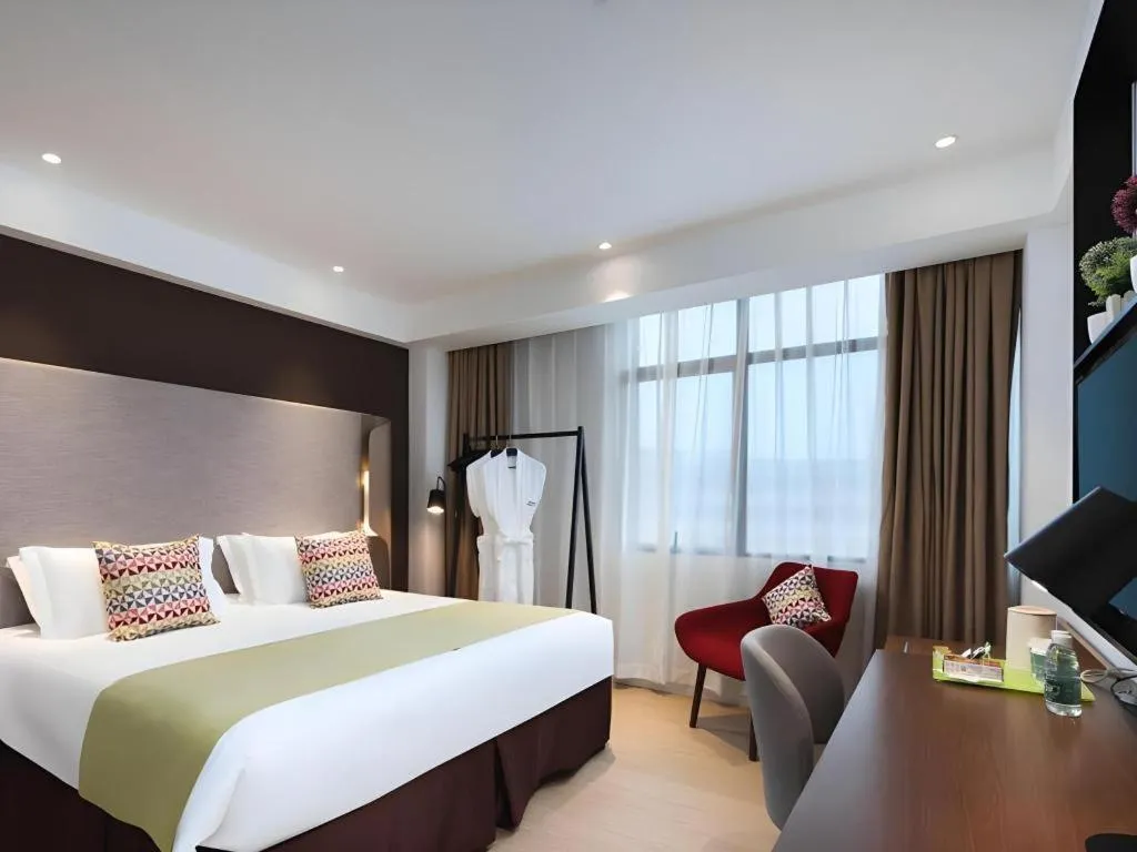 Bed in Campanile Hotel Shenzhen Bay Convention and Exhibition Center