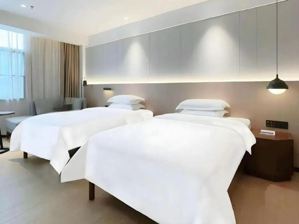 Bed in Campanile Hotel Shenzhen Bay Convention and Exhibition Center