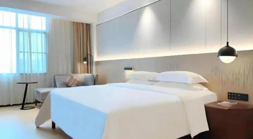 Bed in Campanile Hotel Shenzhen Bay Convention and Exhibition Center