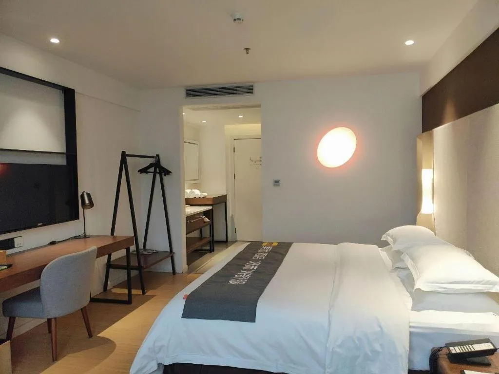 Bed in Campanile Hotel Shenzhen Bay Convention and Exhibition Center