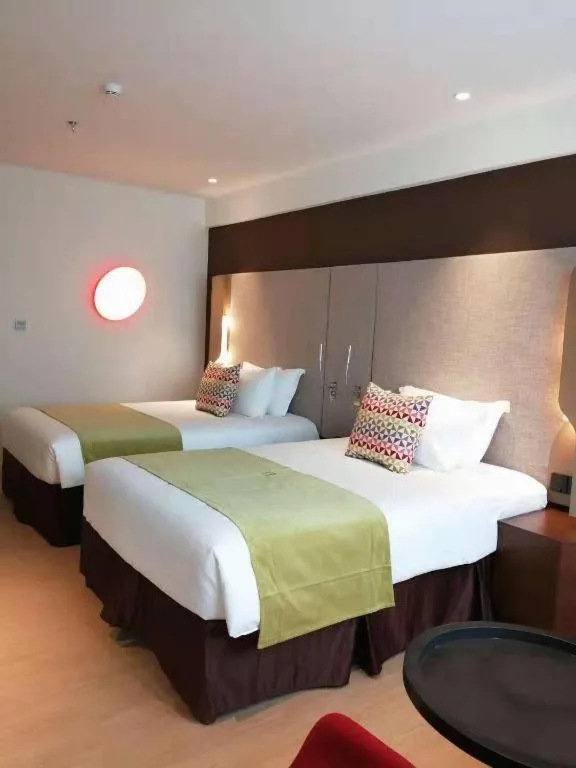 Bed in Campanile Hotel Shenzhen Bay Convention and Exhibition Center