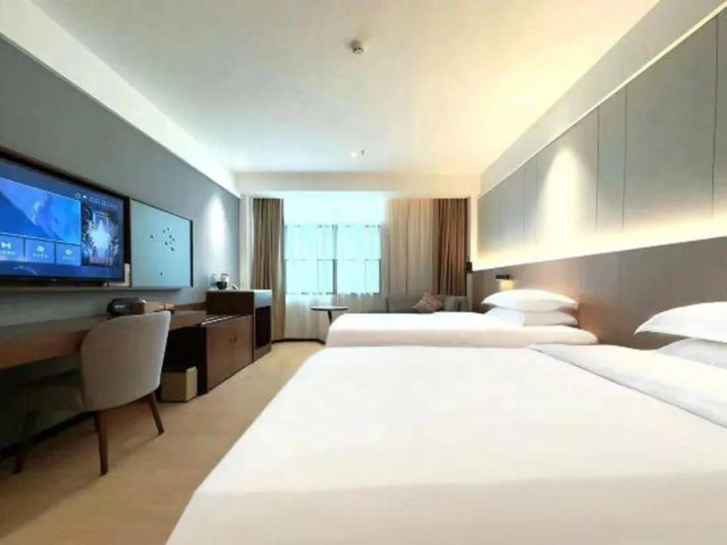 Bed in Campanile Hotel Shenzhen Bay Convention and Exhibition Center