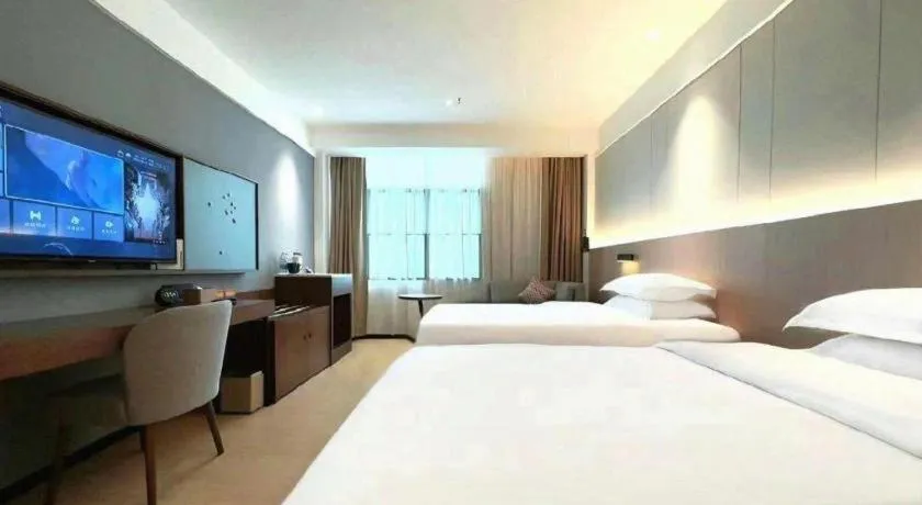 Bed in Campanile Hotel Shenzhen Bay Convention and Exhibition Center