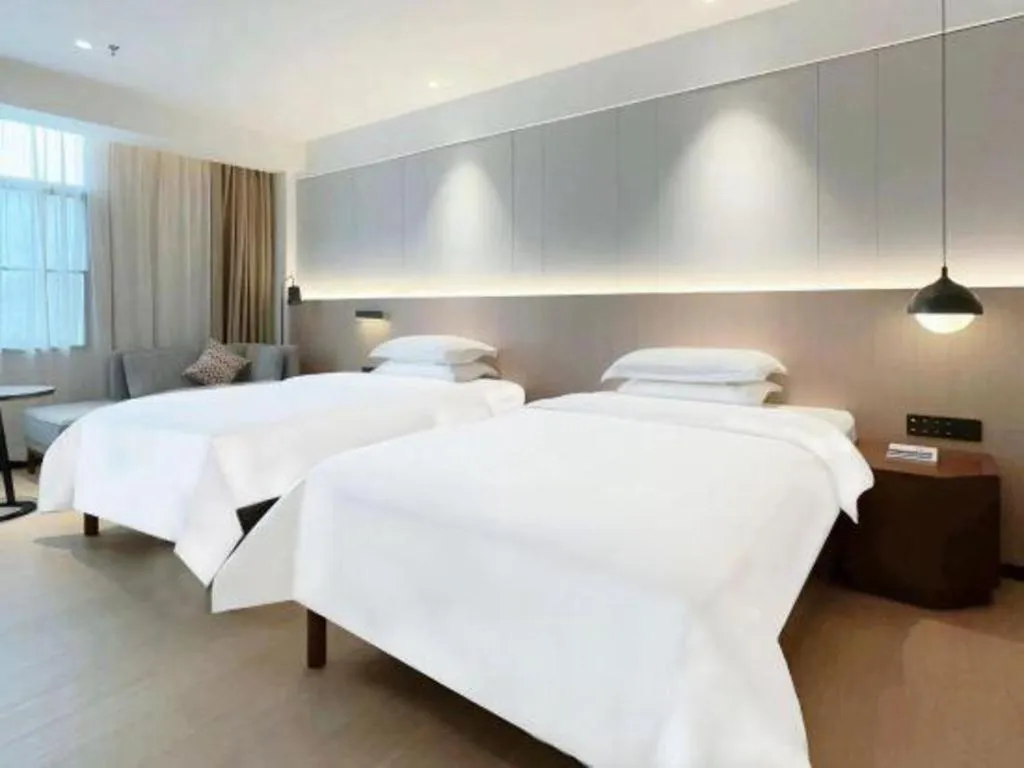 Bed in Campanile Hotel Shenzhen Bay Convention and Exhibition Center