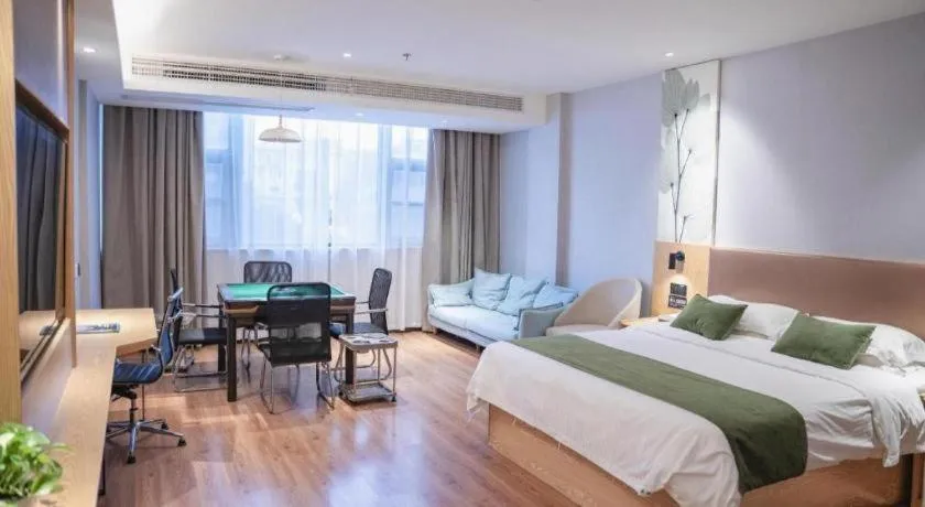 Bed in GreenTree Inn Express Fuzhou Le'an County Government Sijiu Square