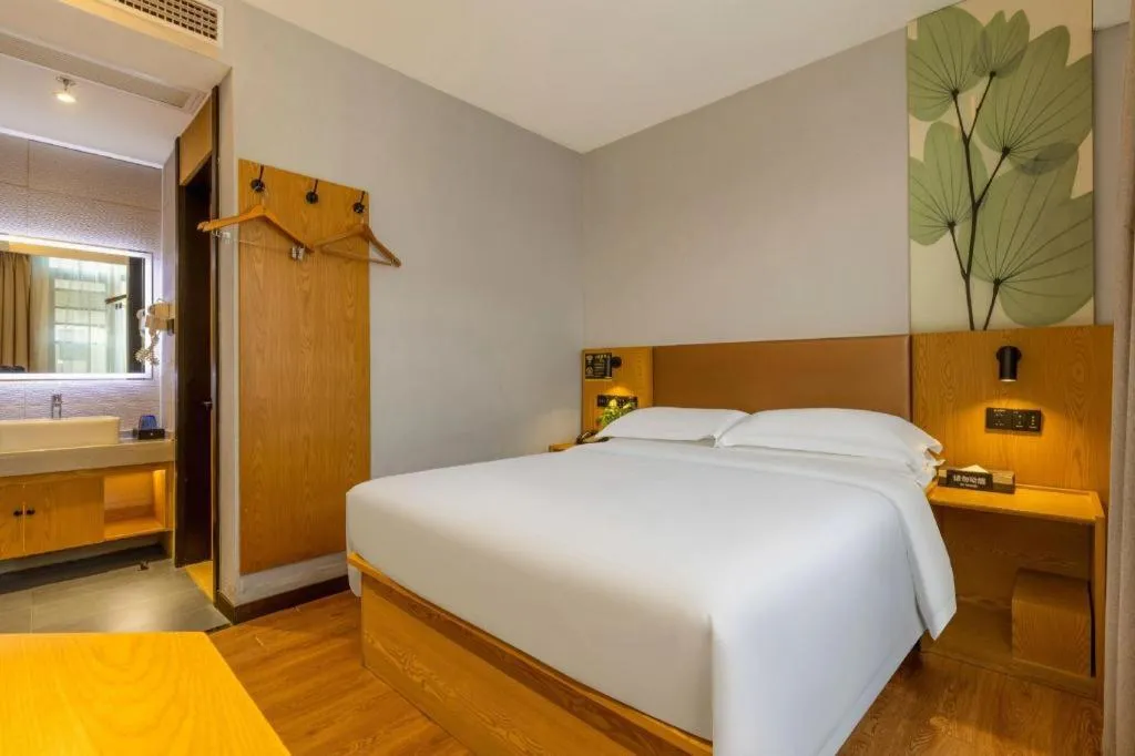 Bed in GreenTree Inn Express Fuzhou Le'an County Government Sijiu Square