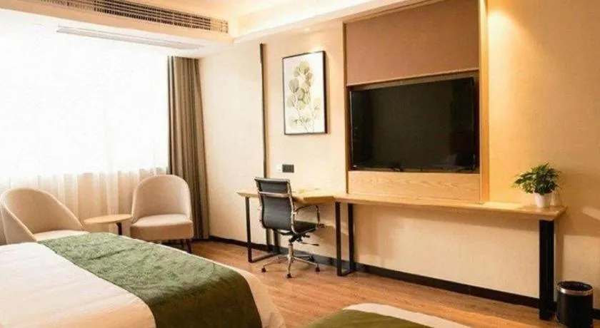 Bed in GreenTree Inn Express Fuzhou Le'an County Government Sijiu Square