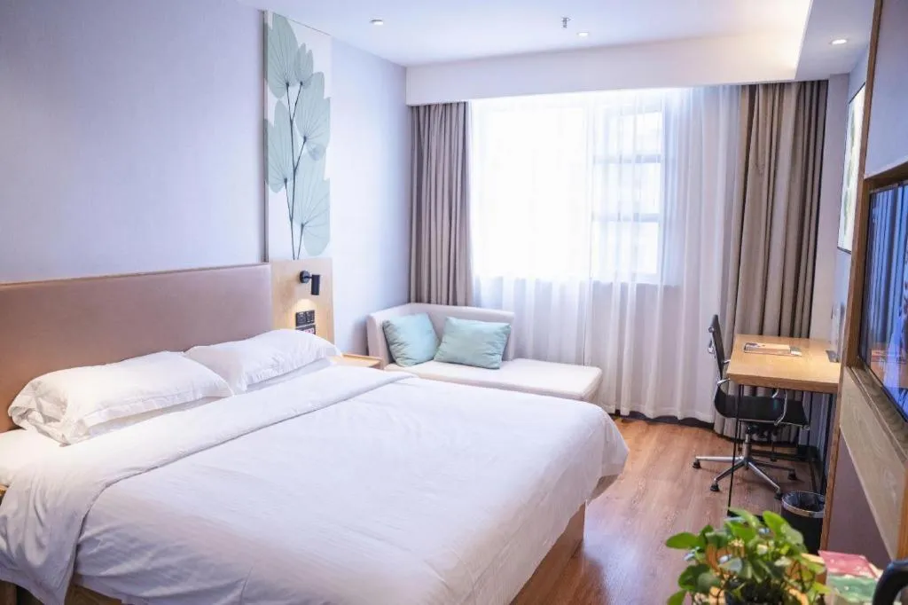 Bed in GreenTree Inn Express Fuzhou Le'an County Government Sijiu Square