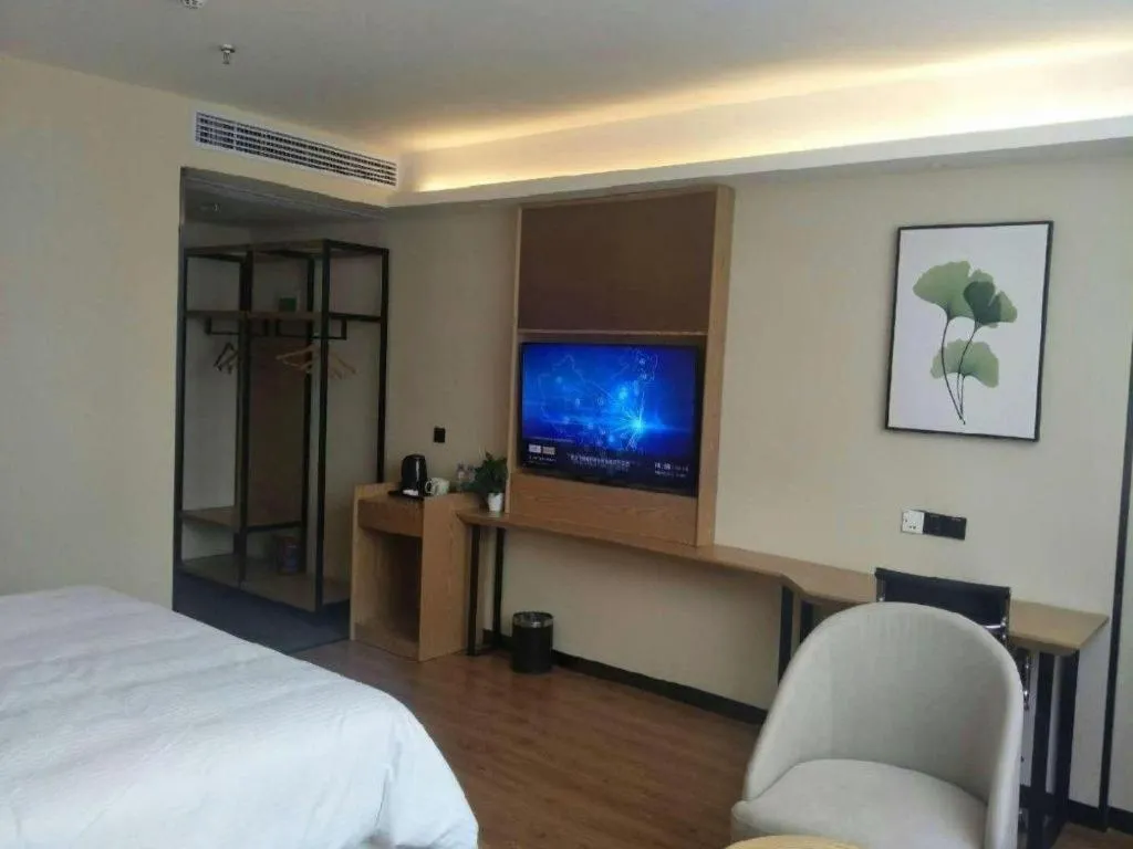 Bed in GreenTree Inn Express Fuzhou Le'an County Government Sijiu Square