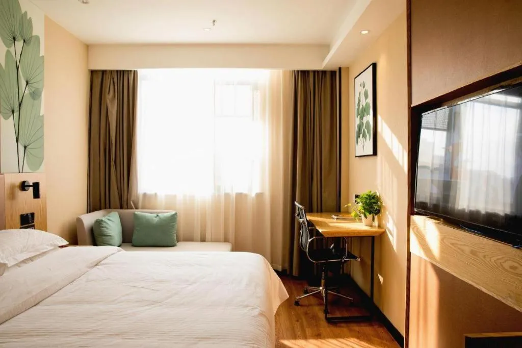 Bed in GreenTree Inn Express Fuzhou Le'an County Government Sijiu Square