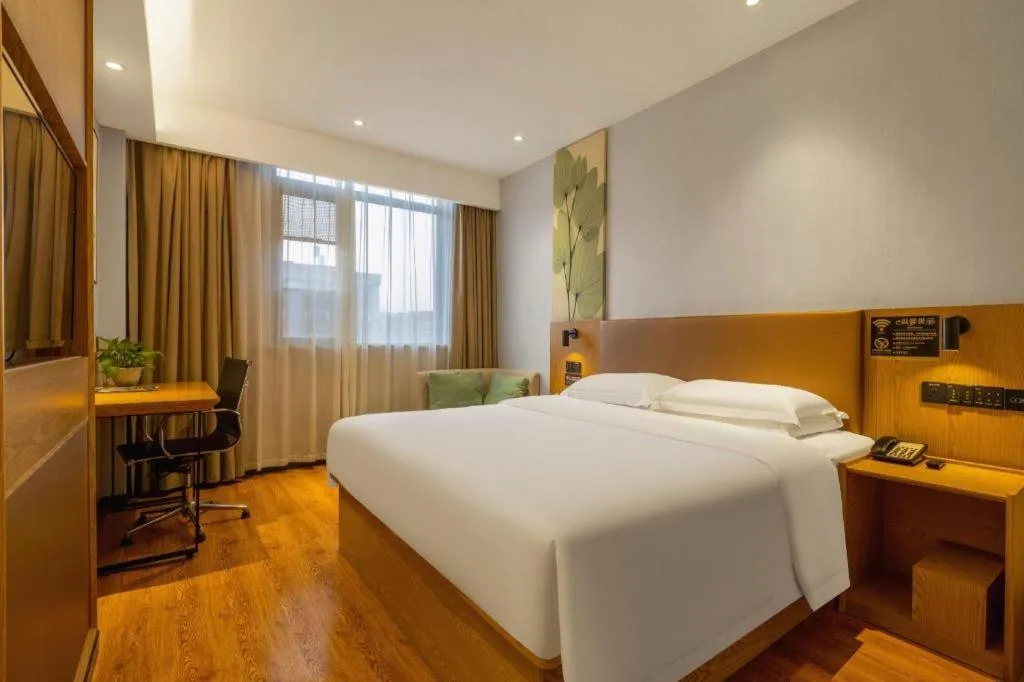 Bed in GreenTree Inn Express Fuzhou Le'an County Government Sijiu Square
