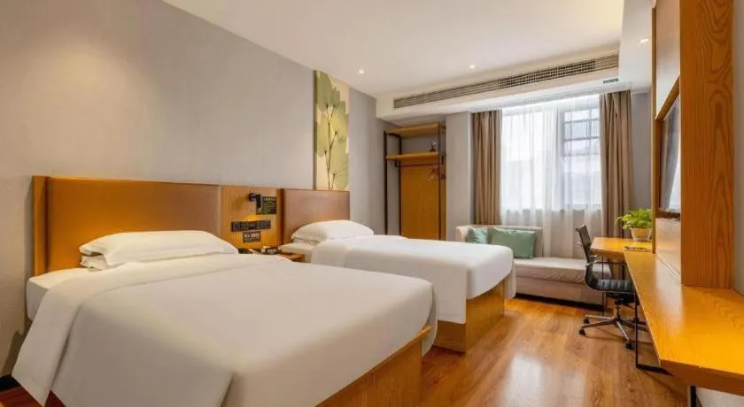 Bed in GreenTree Inn Express Fuzhou Le'an County Government Sijiu Square