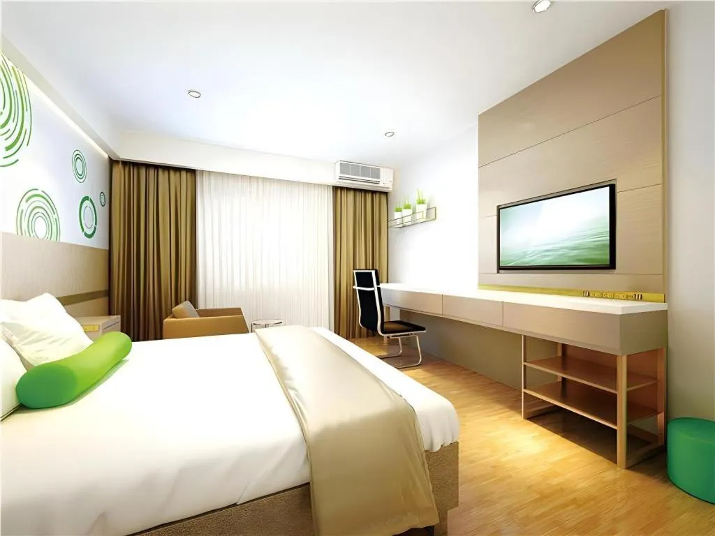 Bed in GreenTree Inn Express Fuzhou Le'an County Government Sijiu Square