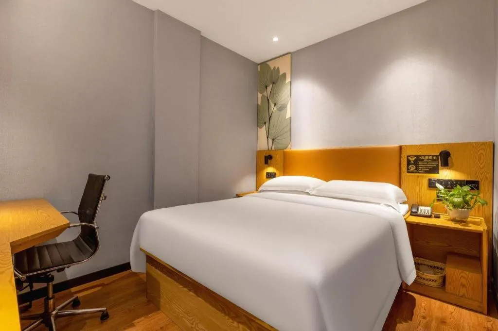 Bed in GreenTree Inn Express Fuzhou Le'an County Government Sijiu Square