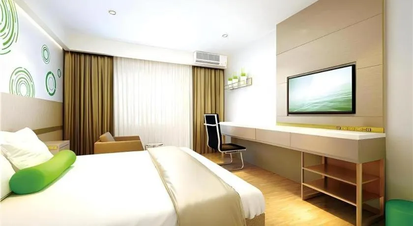 Bed in GreenTree Inn Express Fuzhou Le'an County Government Sijiu Square
