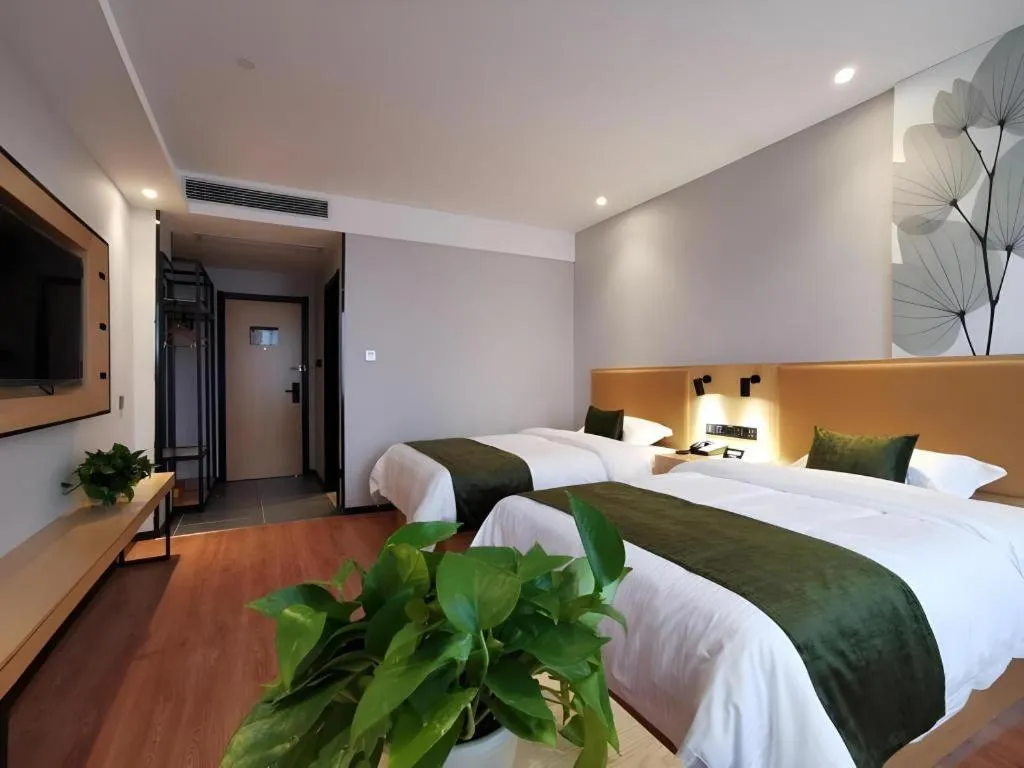 Bed in GreenTree Inn Express Fuzhou Le'an County Government Sijiu Square